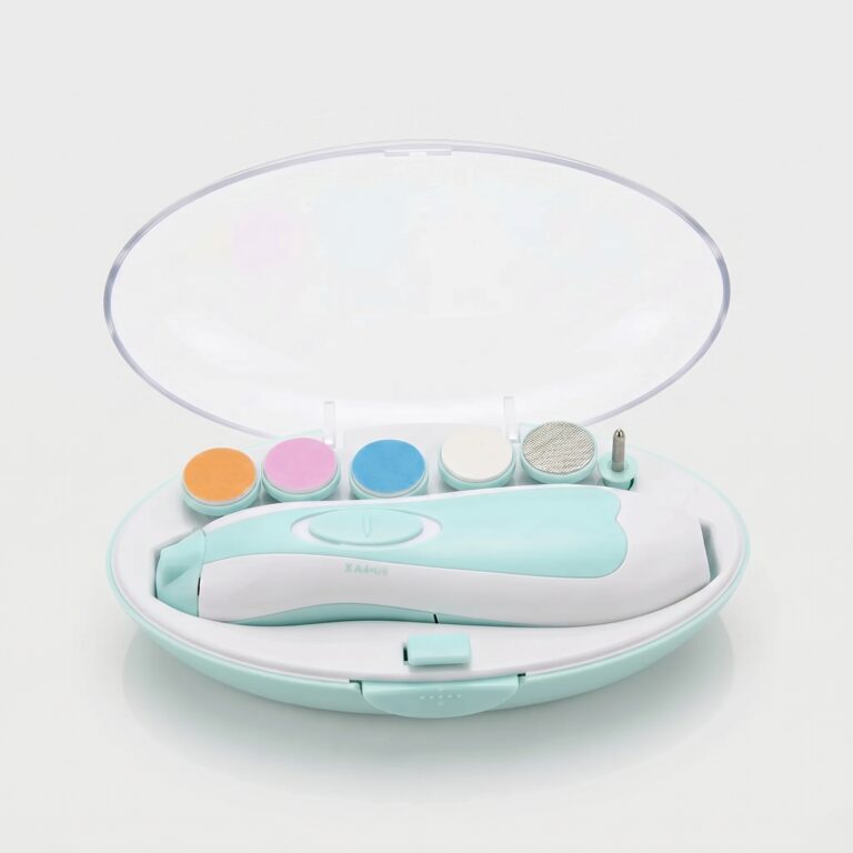 Quiet electric baby nail trimmer with interchangeable filing pads for infants